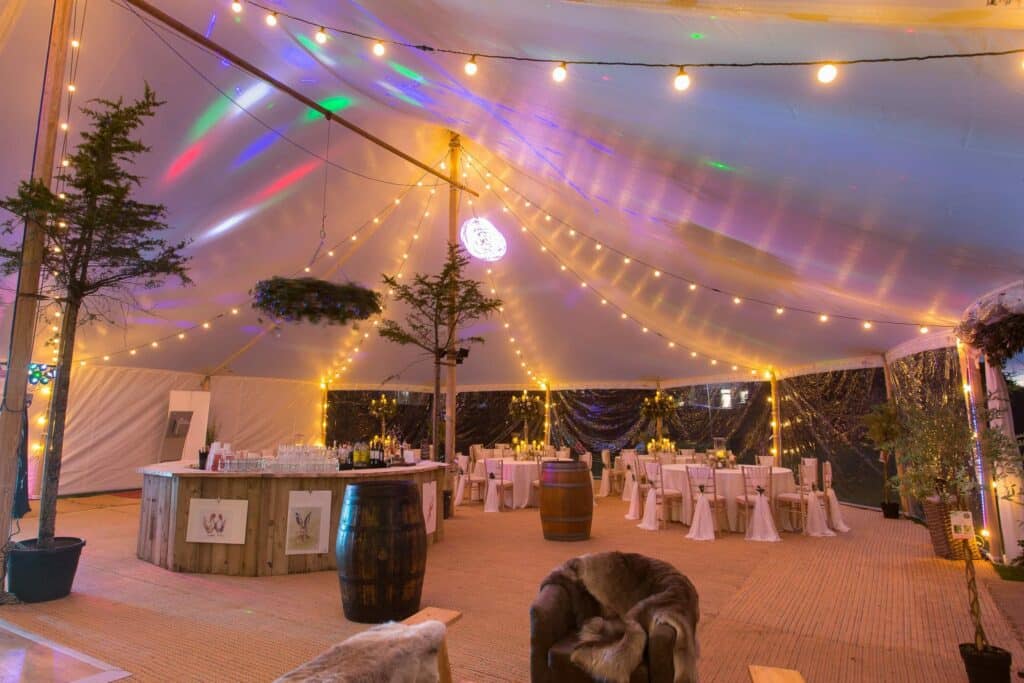 Sailcloth Marquee Hire 8 Aurora evening shot inside scaled 1